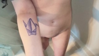 Slow motion piss from dick onto her bald pussy