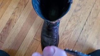 Cowboy cumming on his boots in black Wrangler jeans