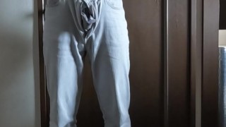 A Japanese man relieves his work stress by masturbating his nipples and cock.