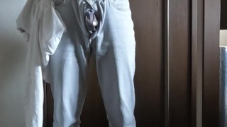 A Japanese man relieves his work stress by masturbating his nipples and cock.