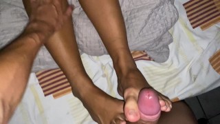 Asian girl Footjob with a big dick