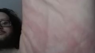 Long-haired chubby bottom shows you his ass, feet, and plays with his dick.