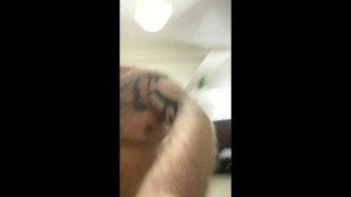 Builder Danny Wyatt takes a smoke break showing off his big belly