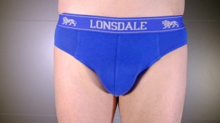 Close up strip to underpants then show flaccid uncut penis and foreskin