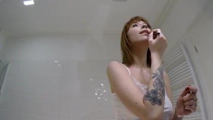 One of the Hottest Redhead College Girls every with a Short Modified Miniskirt and No Panties No Bra in the Bath shows Pussy