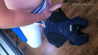 Basebal boy jerks and blows all over his chest plate
