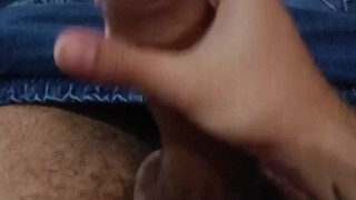 POV Jerking my big uncut cock after a long day and releasing my cum load.