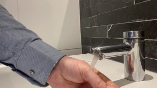 Masturbating in a public toilet with a banana in my ass, cumming all over the toiletseat