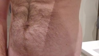 Hairy man showing body and curved dick