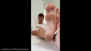 Dominant Aussie boy teases you with his stinky black socks and soles making you sniff