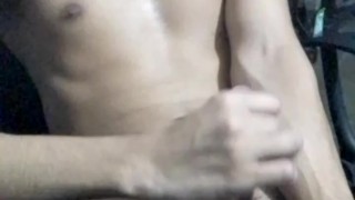 Guy in shorts masturbates until he has an orgasm