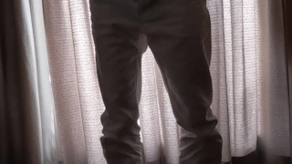 A Japanese man masturbates in a dimly lit room with the curtains closed so his family won't find out
