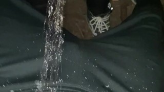 Pissed on with clothes outdoor