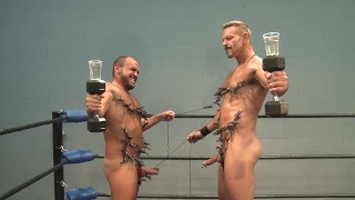 Colin Steele And Jessie Balboa Pinch Each Other With Pegs