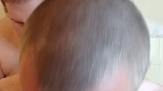 Bear licking Chaser in the Bathtub