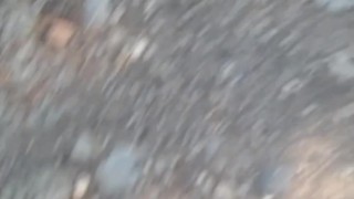 Taking a piss on a mountain road