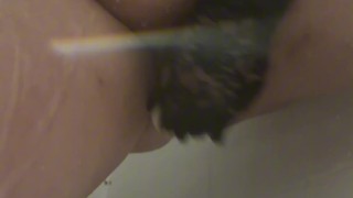 Playing with my toy in the shower 😋