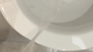 pissing hard at public wc