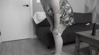 A mature BBW milf with big saggy tits and a hairy pussy gets dressed.