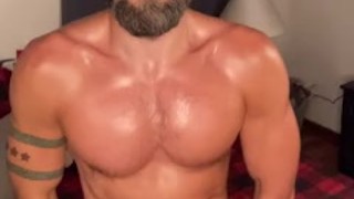 Bearded jock shows off his pump