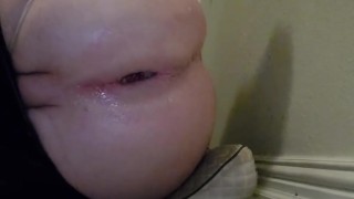 Giant xl butt plug under my tights held by Tiny g string