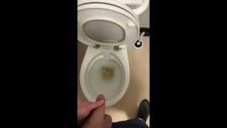 Pissing after sweaty gym wank