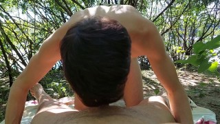 Young twink gets a tasty cumload from an older stranger at nude beach while public cruising