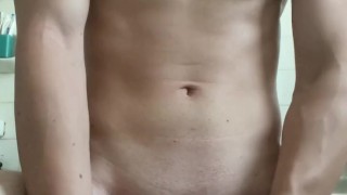 Fit tattooed Twink jerking off in the shower