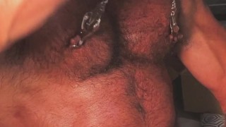 Rogan uses his Nipple Clamps on his massive pecs!