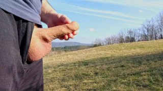Big dick cum twice in the middle of huge meadow, anybody could watch me