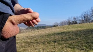 Big dick cum twice in the middle of huge meadow, anybody could watch me