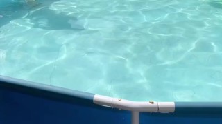 Sexy femboy swimming in pool and playing with dildo