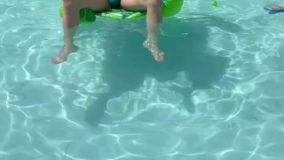 Sexy femboy swimming in pool and playing with dildo