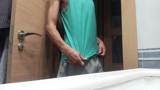 Slim Guy in a Tank Top Shows How He Cums with His Huge Shaved Cock