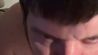 Sucking on a 9 inch dildo