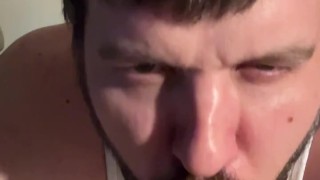 Sucking on a 9 inch dildo