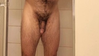 Hairy muscle bear flexing in hot shower!