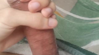JACKING OFF WITH A CONDOM