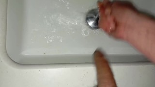 The Pig With The Fat Flaccid Cock Full Of Semen Plays To Stick His Finger In His Foreskin