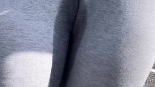 she couldn’t hold it and pees through her leggings in public