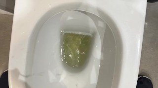 hot pissing at a public bathroom