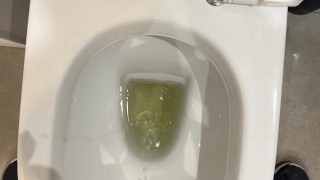 hot pissing at a public bathroom