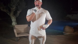 Oiled up spandex muscle man