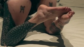 Tattooed MILF in Hotel Tease
