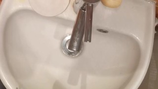 POV desperation pee into a sink AGAIN