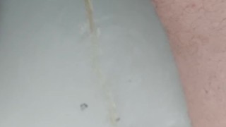 Pissing in bathtub