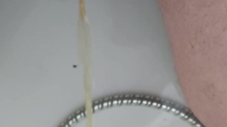 Pissing in bathtub