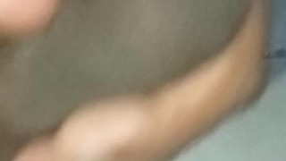 Sitting on the floor and using hands