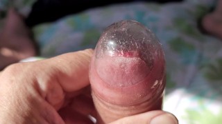 Wanking wearing a cock sleeve