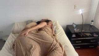 Lesbian sex under the covers on a cold morning